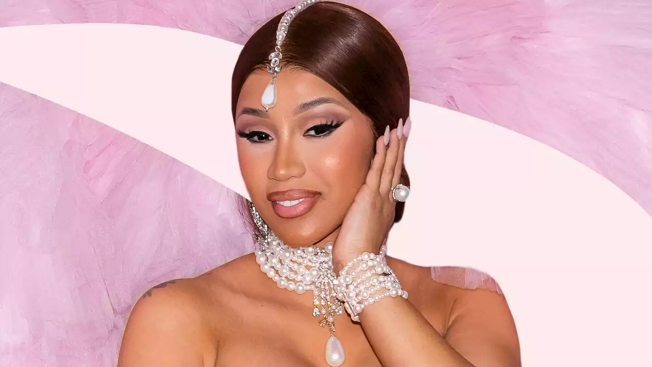 Cardi B just threw her microphone at a fan who flung their drink at her mid-concert