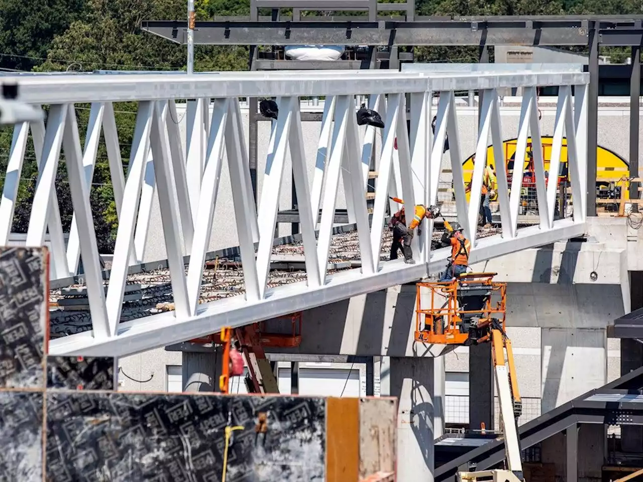 Western section of Queensway to re-open Monday morning following pedestrian bridge installation