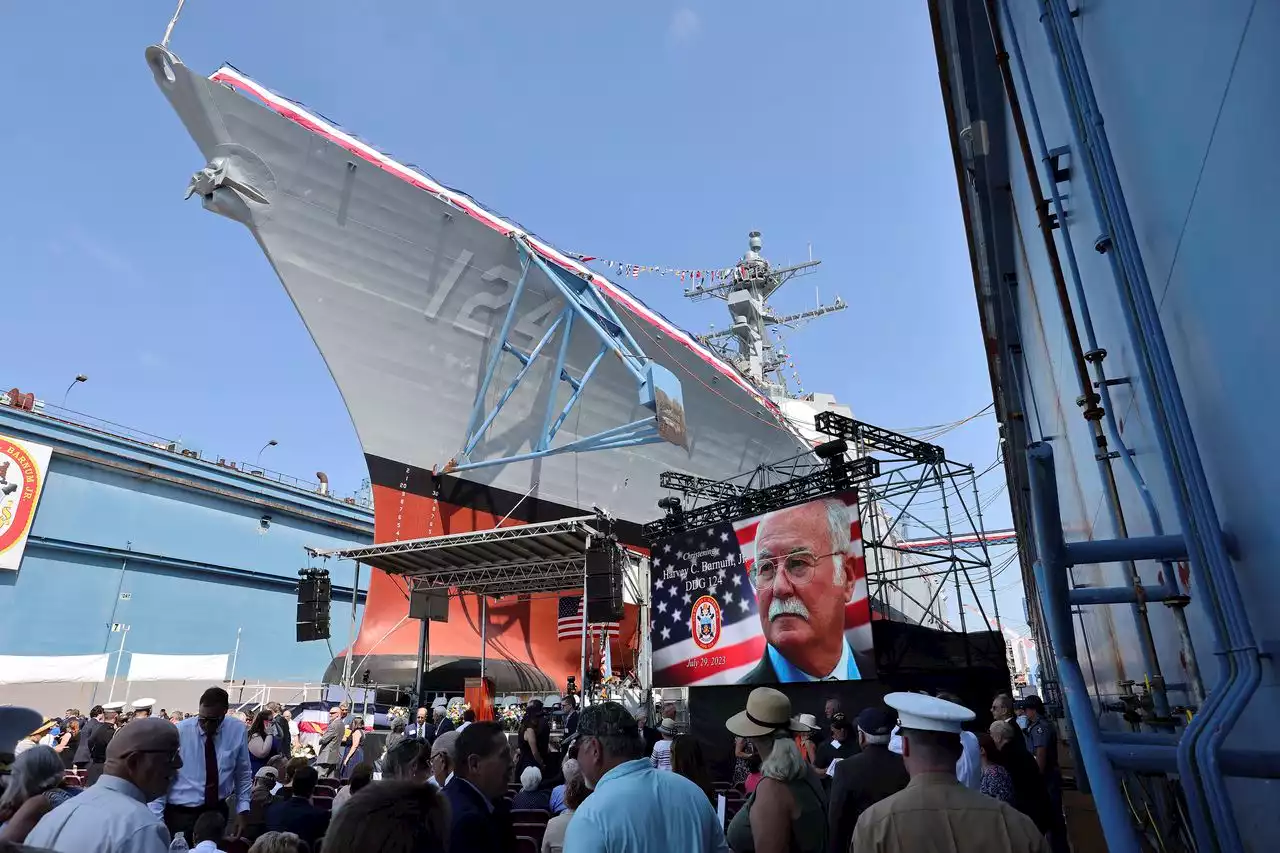 Medal of Honor recipient watches as warship bearing his name is christened in Maine