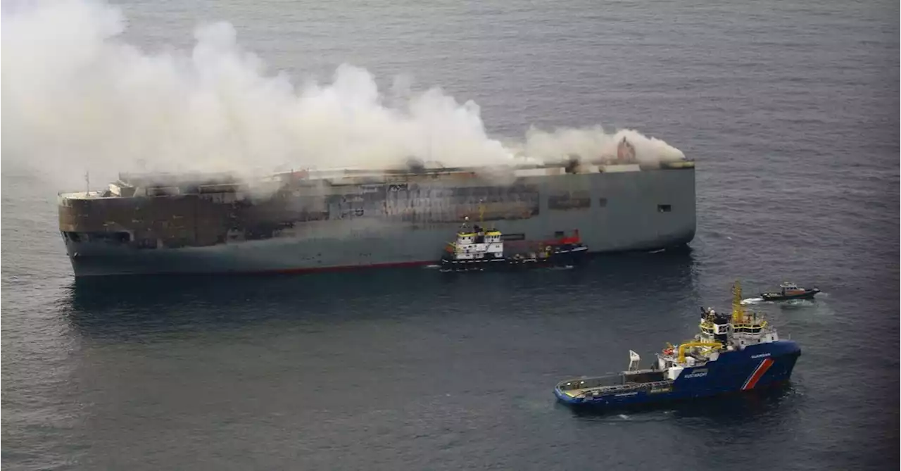 Burning car carrier off Dutch coast being towed away from shipping lanes