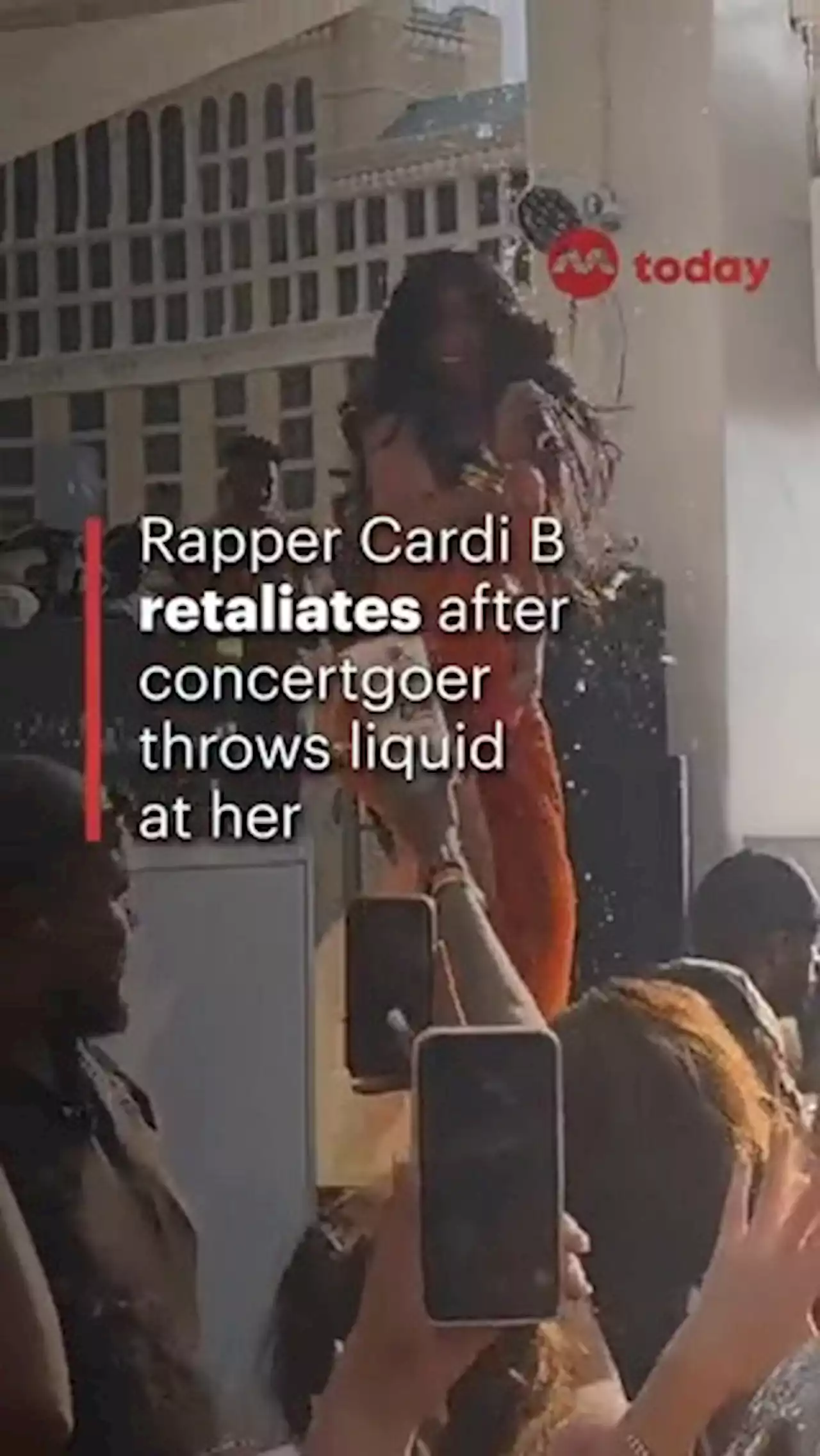 Rapper Cardi B, the target of a thrown liquid, retaliates