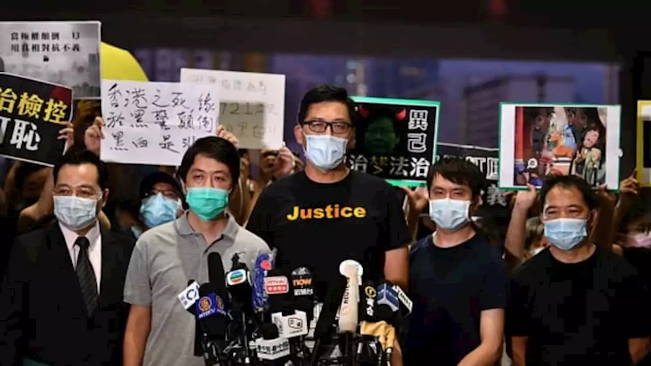 Hong Kong leader vows to pursue 8 activists 'for life' over alleged national security offences