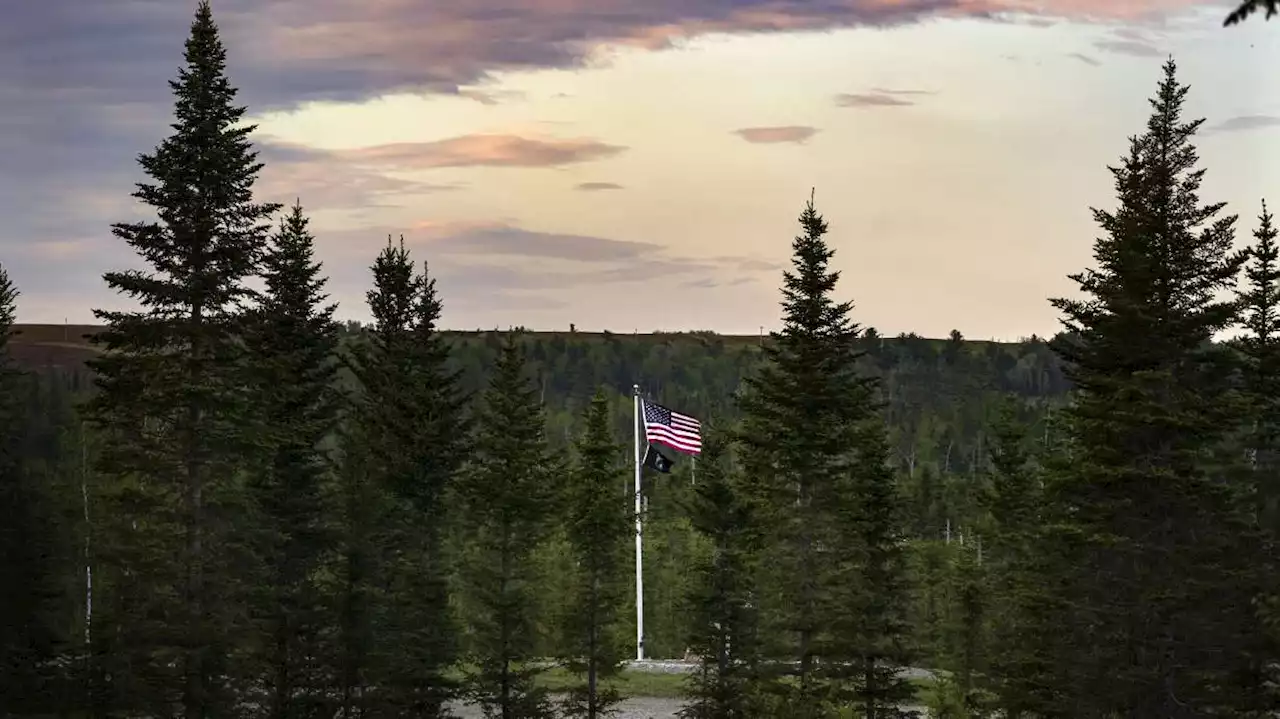 They envision the world's tallest flagpole in this Maine town. Instead of uniting, it is dividing