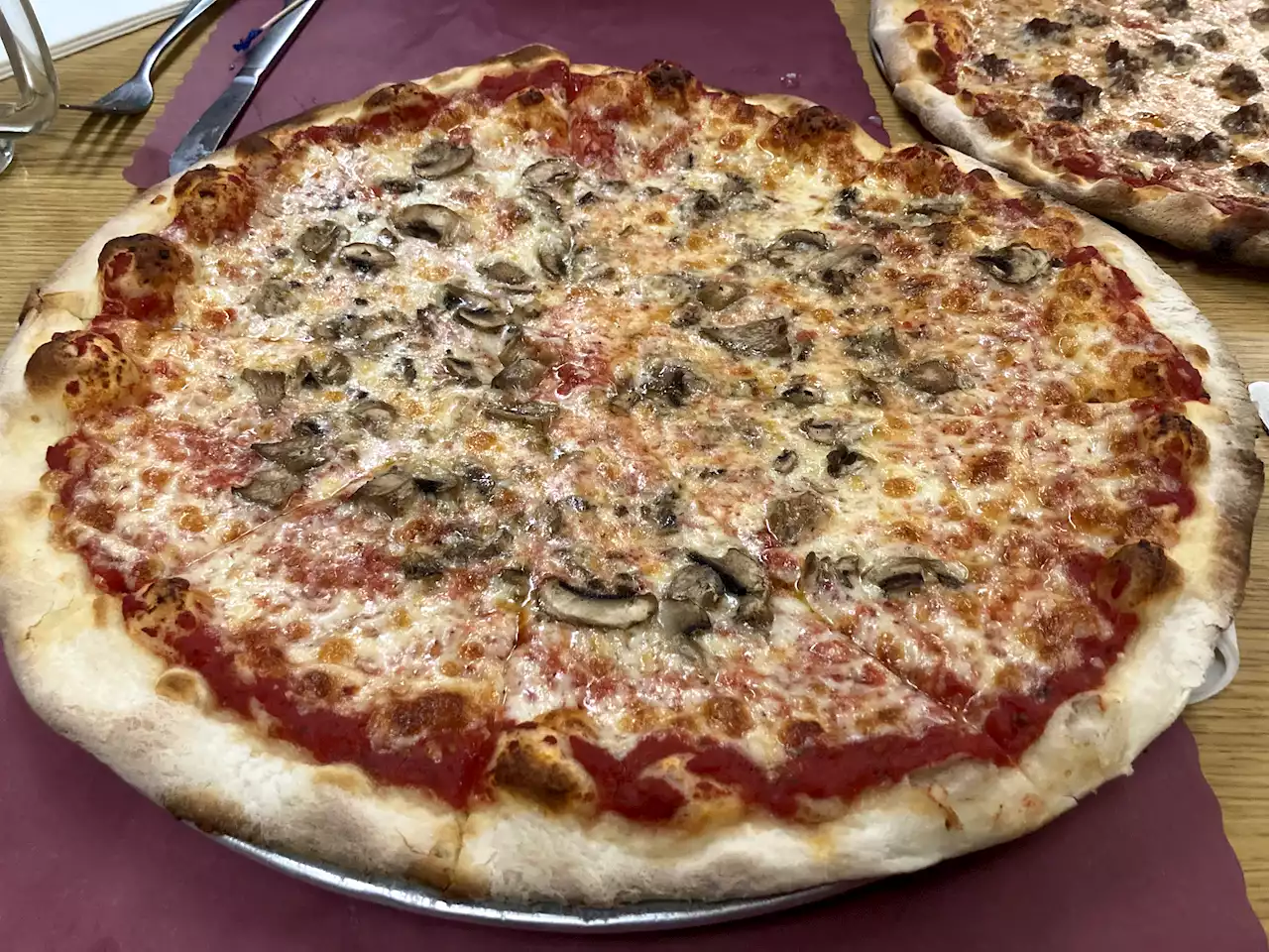 This Boston icon is a portal to an older time — with pizza as great as ever