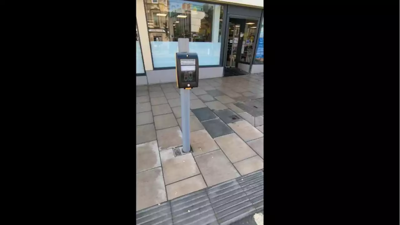 Cyclists unable to reach 'stupid' traffic light button, plus face nine-minute wait for green light as more issues reported with much-criticised cycle lane