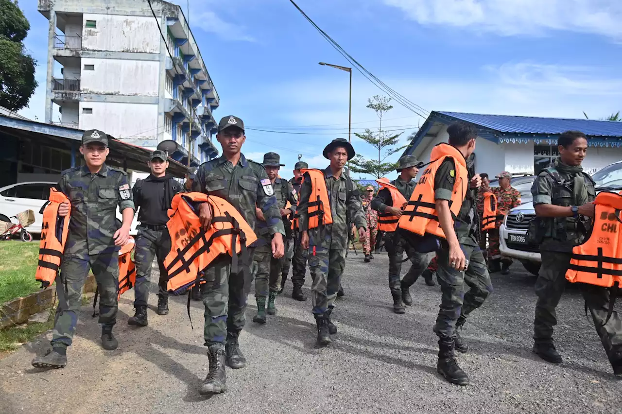 Operasi pencarian tertumpu di tebing sungai, darat