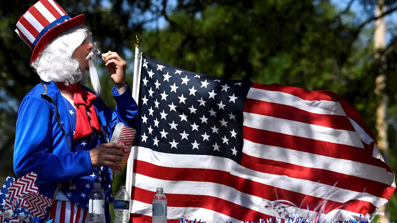 Revelers across the US brave heat and heavy downpours to celebrate Fourth of July