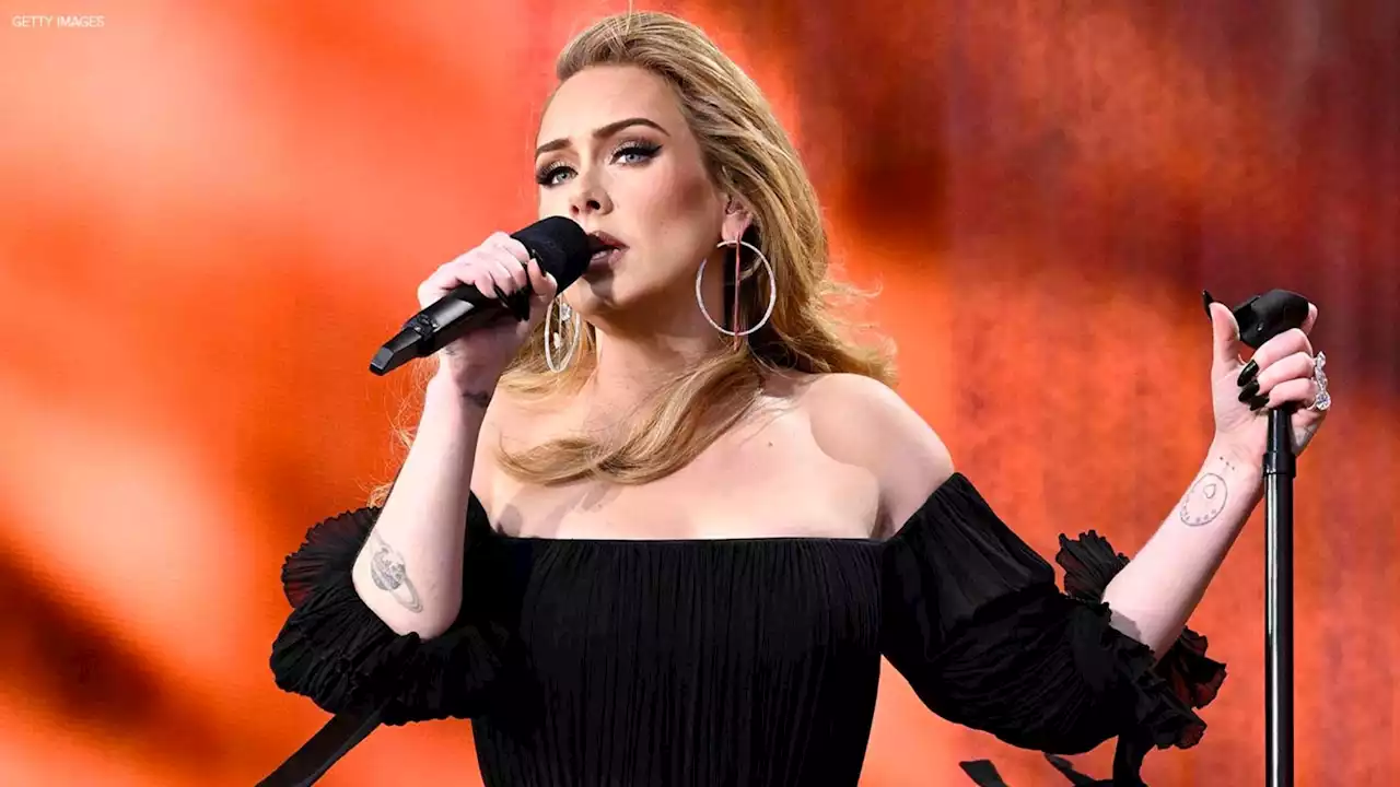 Adele wants you to stop throwing things during concerts: 'I f**king dare you'