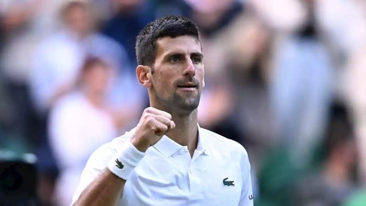 Djokovic reaches round three and another milestone