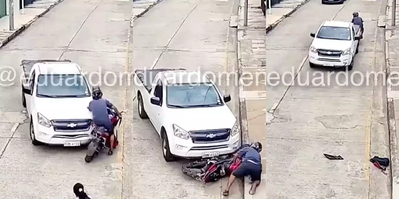 Video: Conductor le tira el carro a un ‘motoladrón’ varias veces para salvar a una mujer