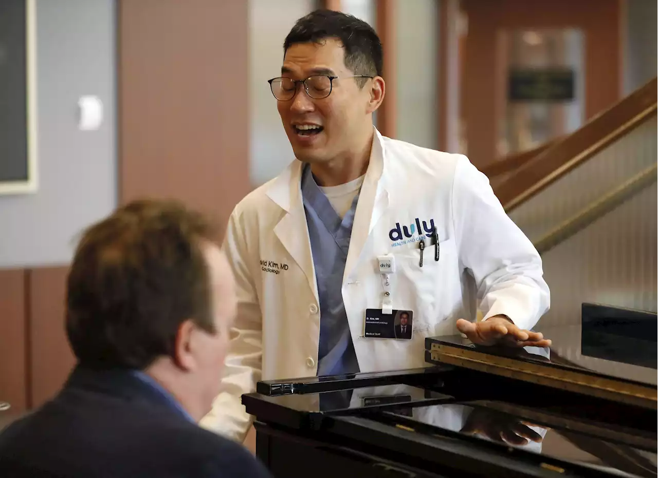 From the heart: A retired music professor and cardiologist are bringing joy to Edward Hospital