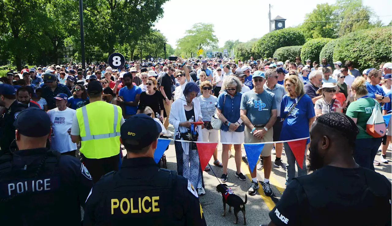 Healing in Highland Park: Community walks parade route on anniversary of shooting