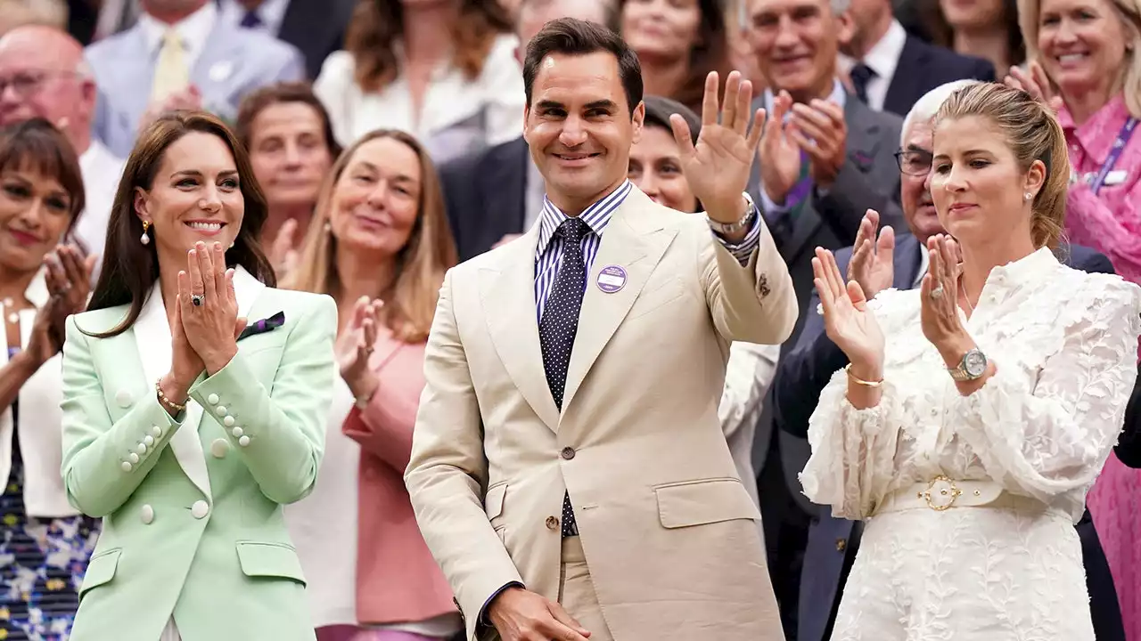 Princess Kate gives Wimbledon champion Roger Federer a lengthy standing ovation at the All England Club