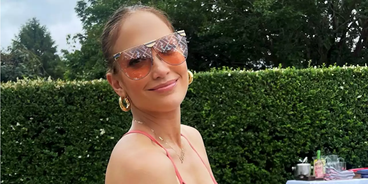 Jennifer Lopez’s Steamy Fourth of July Outfit Includes a Coral Swimsuit With Bust Cutouts