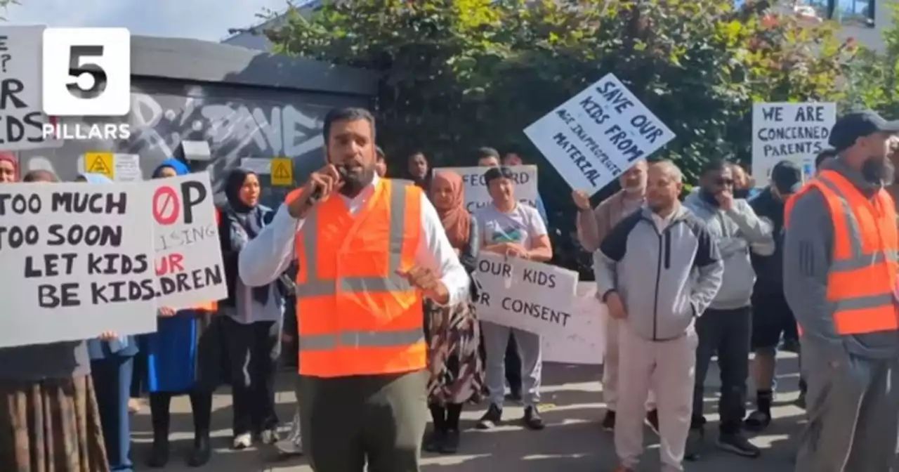 Parents opposed to LGBT material being shown to their children protest at school