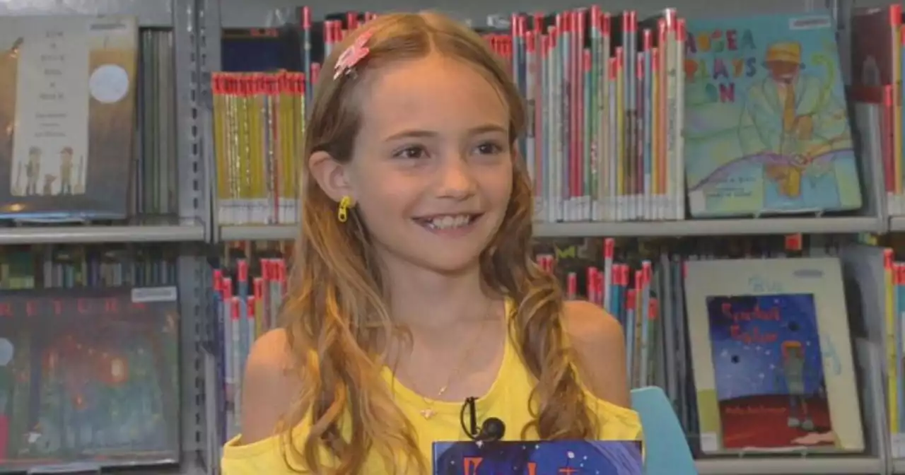 'Rocket Rider' 10-year-old author donates books to Aurora Public Library for all to read