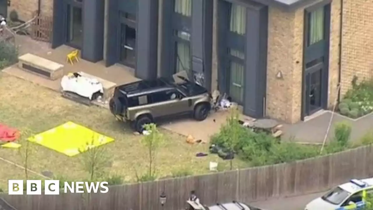 Wimbledon school crash: Girl, 8, dies after car hits building