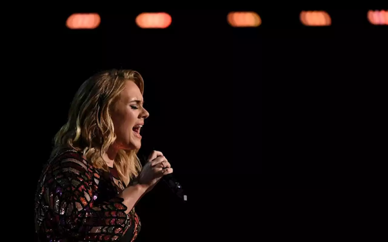 Hello? Don’t throw stuff at us, Adele urges fans