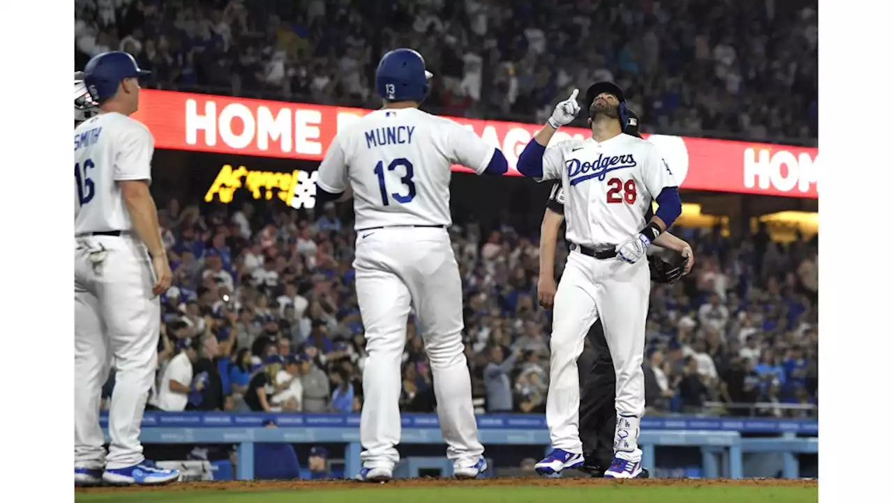 Dodgers dig out of early hole, hold on to beat Pirates