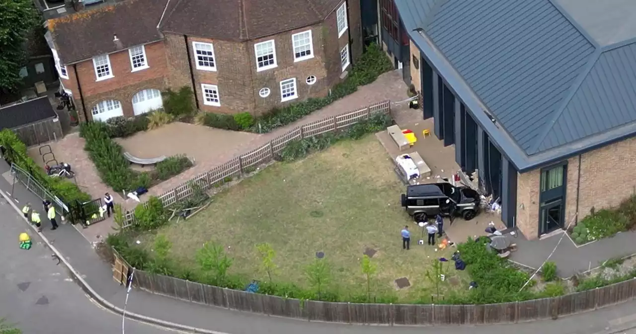 Girl, 8, dead and 10 rushed to hospital after Land Rover crashes into school