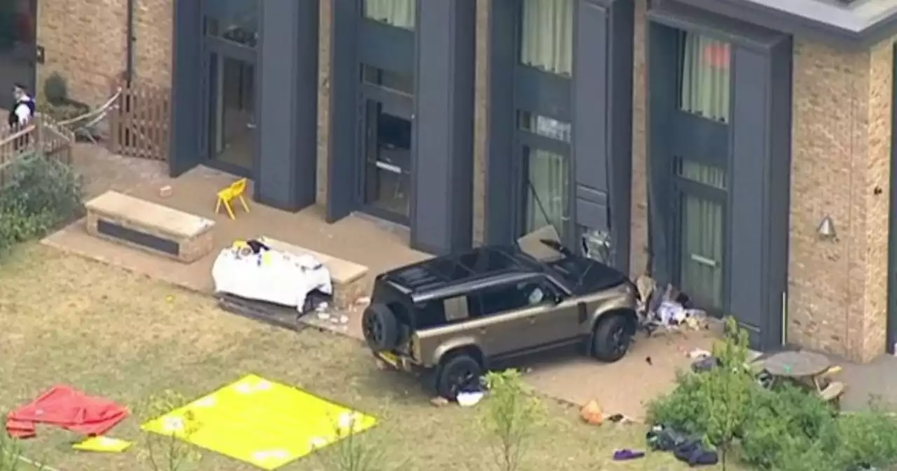 10 people taken to hospital after Land Rover crashes into school, killing girl