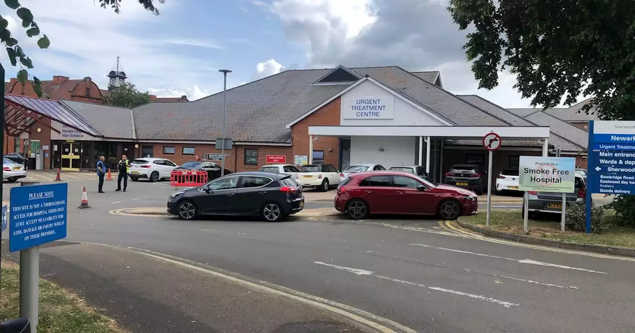 Vehicles park on double yellows and grass verges as car park full