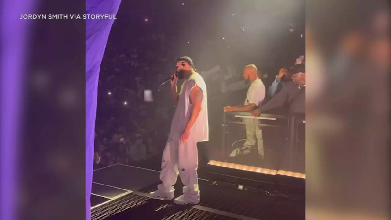 Fan throws cellphone at Drake as he performs on stage, hitting him