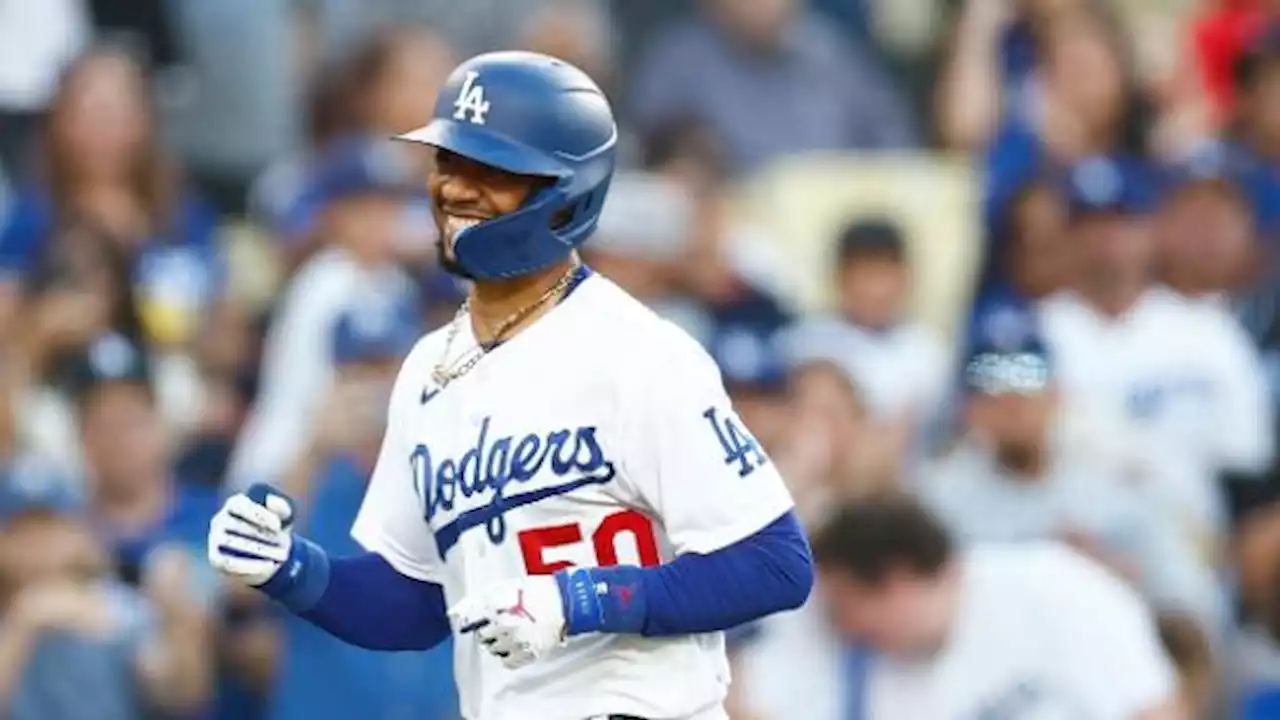 Betts hits two of Dodgers' five homers and drives in four runs in 11-4 victory over Angels