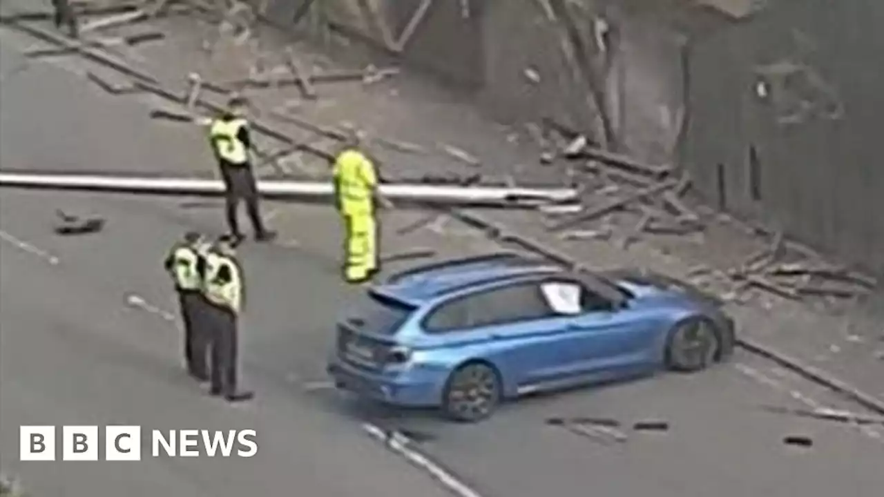 Driver flees after BMW smashes into lamp-posts and wall in Dundee