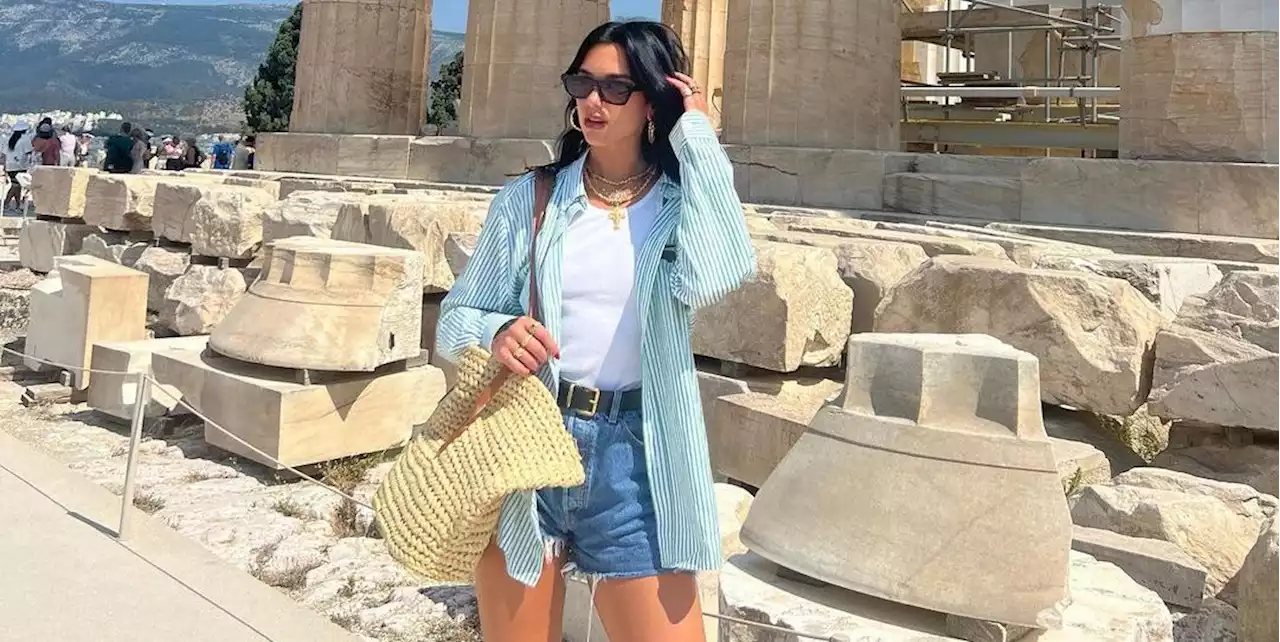 Dua Lipa Pairs a Striped Button Down and Denim Shorts in Greece