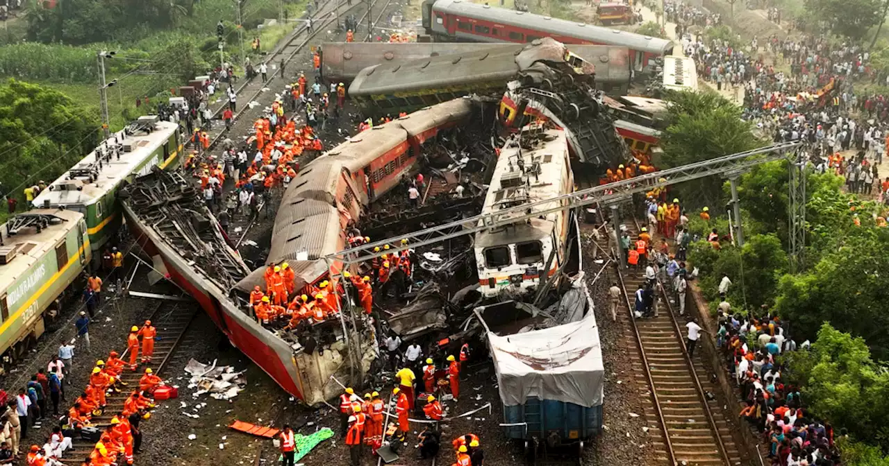 Three officials arrested in India over train crash that killed more than 290 people