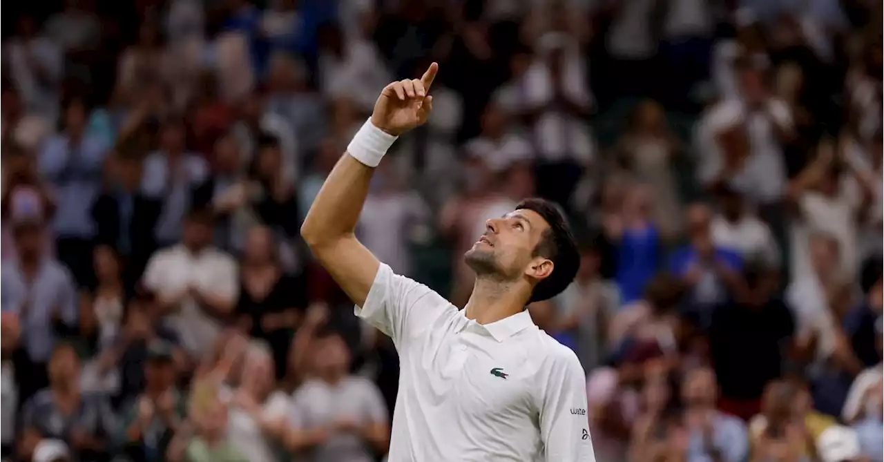 Djokovic beats Wawrinka just before closing time