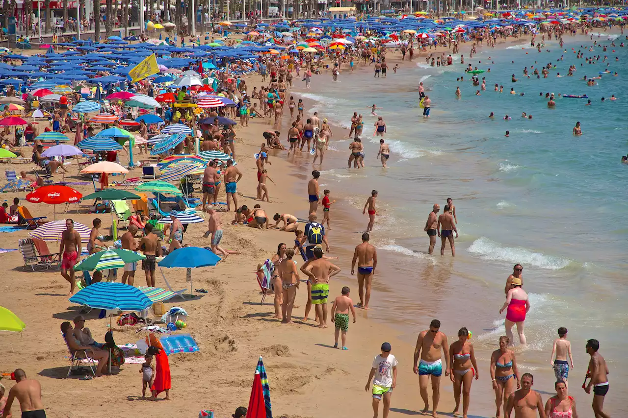 Spanish resort goes to war on 'beach hoggers' as Brit tourists face fines