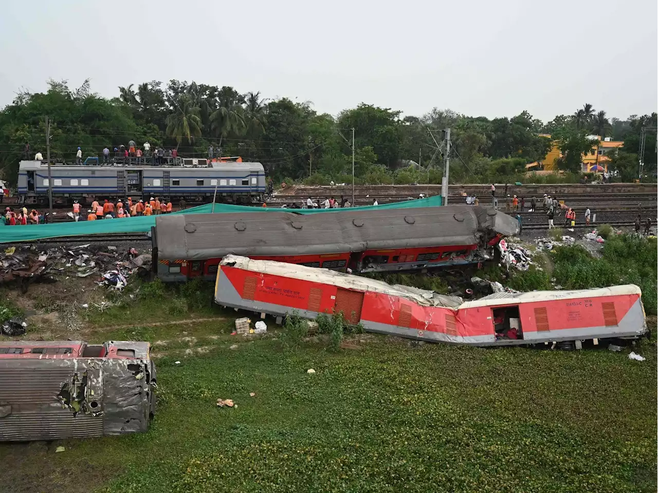 3 railway officials over train crash in India that killed more than 290 people