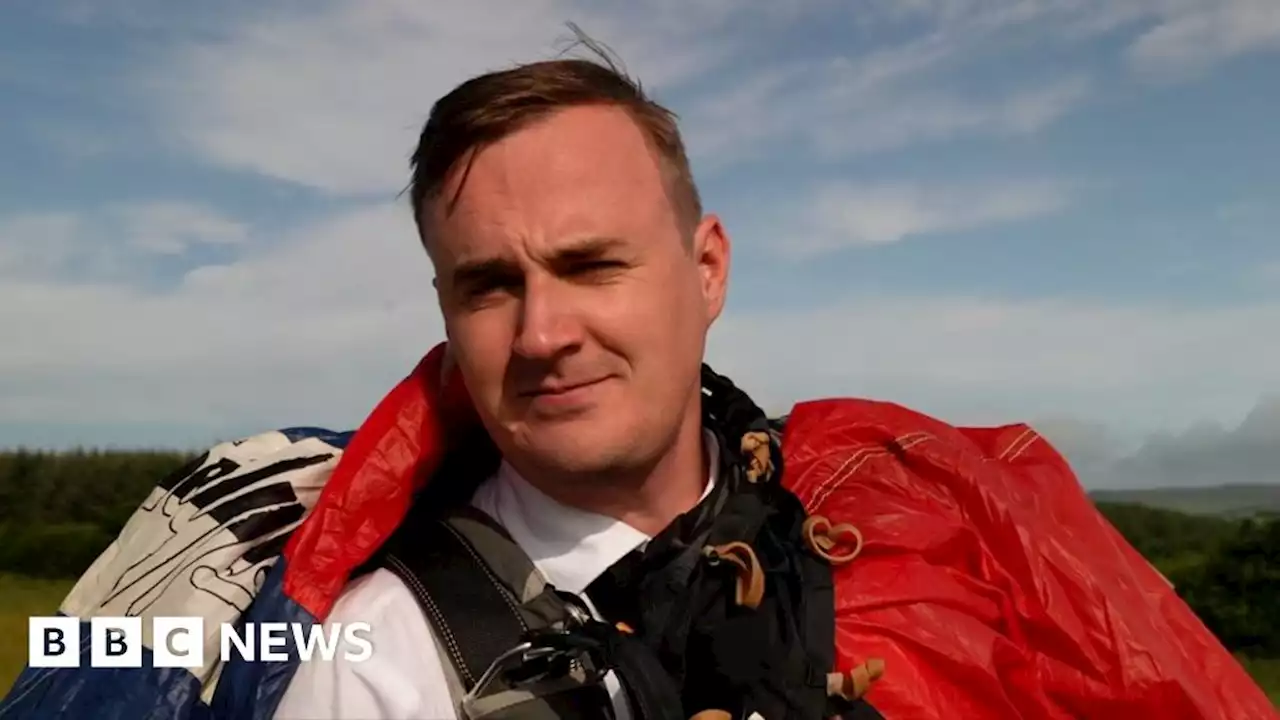 Groom skydives into wedding ceremony