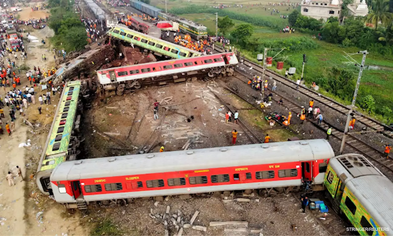 Three railway officials arrested over train crash that killed 275 people in India