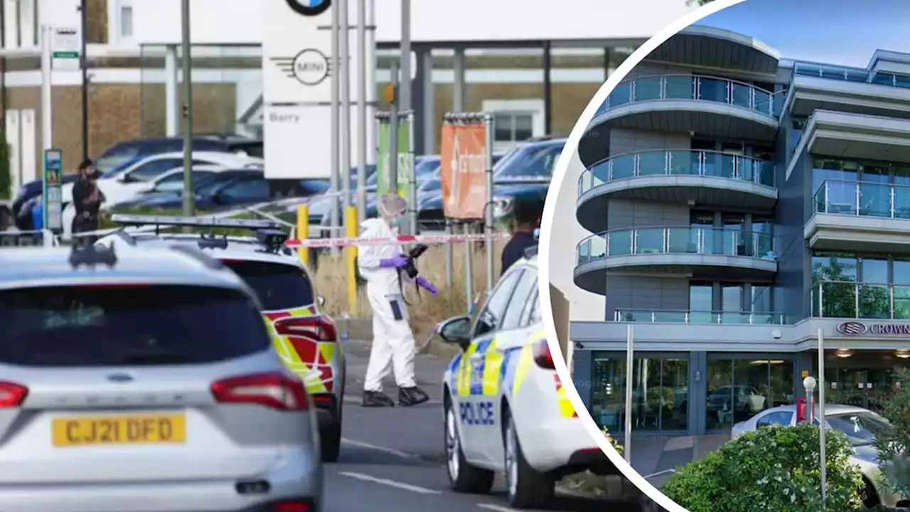 Man arrested for attempted murder after two stabbed around Surbiton hotel as witness claim bandaged man 'led away'