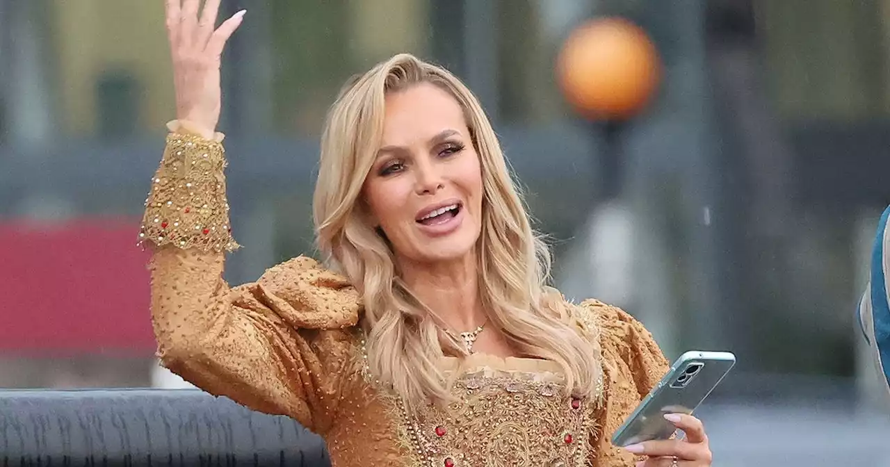 Amanda Holden dresses as a princess and gives royal wave as she films advert