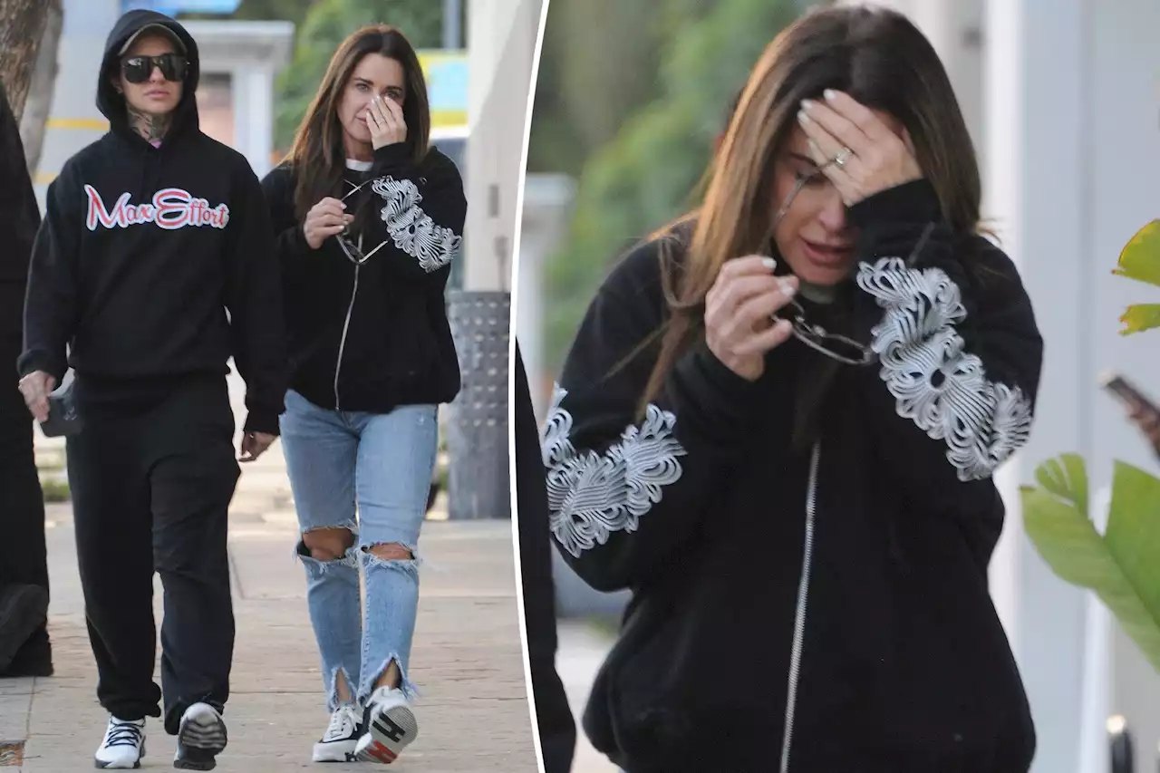 Kyle Richards attempts to hide her face while hanging out with Morgan Wade amid dating rumors