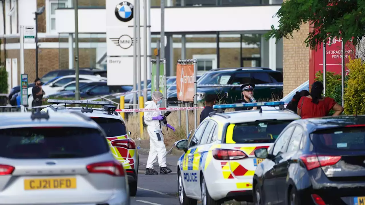 Surbiton: Man arrested after two stabbed at hotel and garage in southwest London