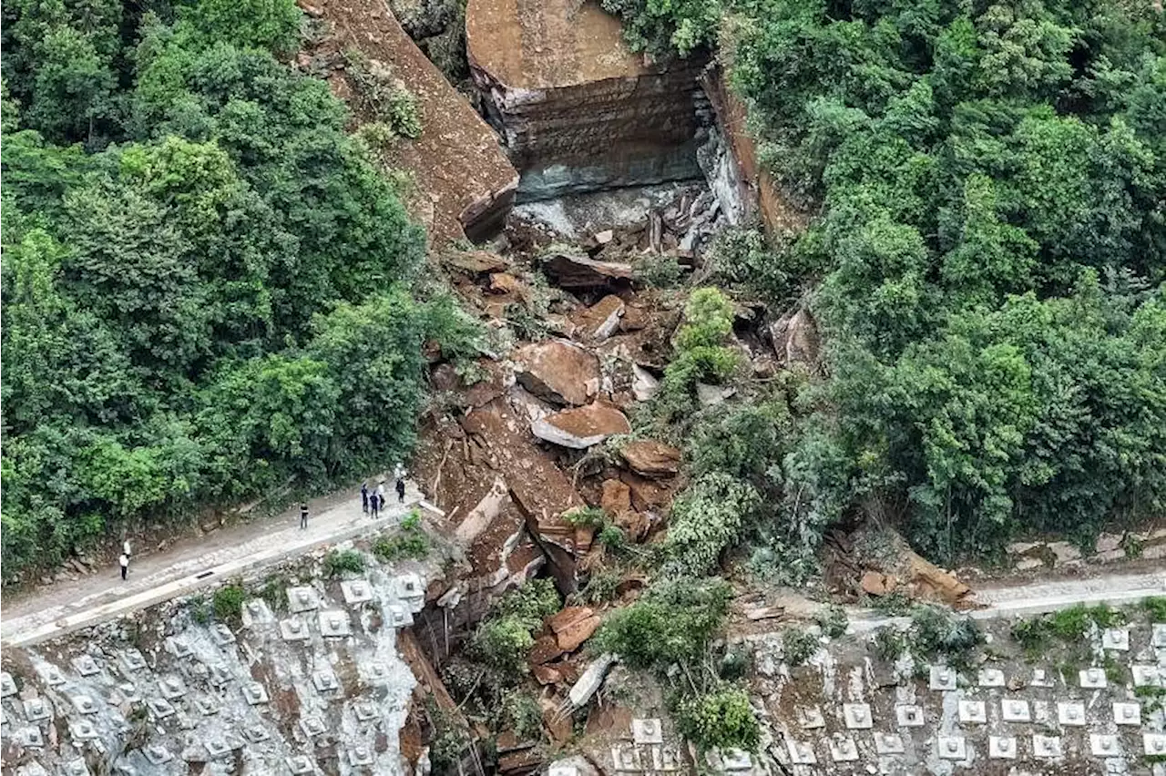 One dead, 7 missing in central China highway landslide