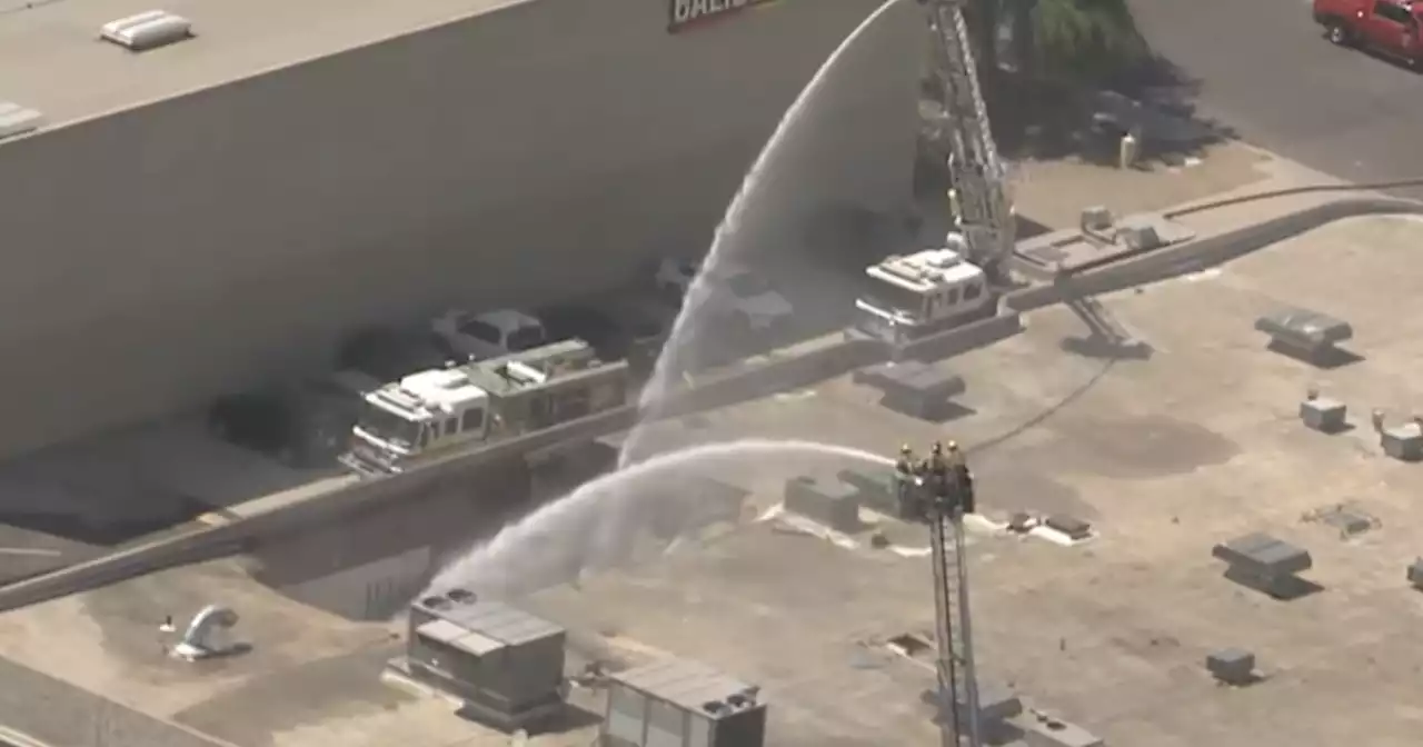 Four people injured in explosion, fire at commercial building in Phoenix suburb