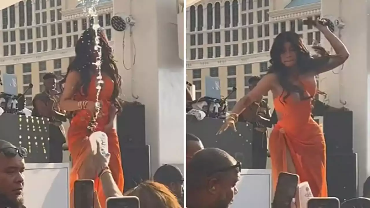 Police investigating after Cardi B throws mic at concertgoer who threw drink at her during show