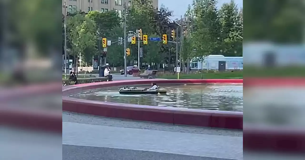 Someone brought an actual raft to Toronto's new Love Park pond