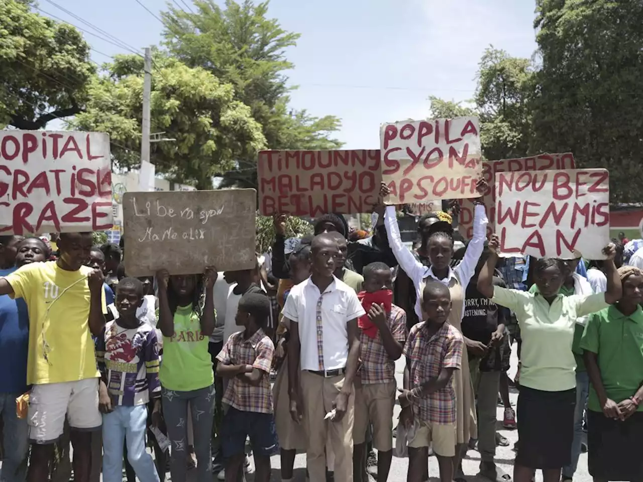 Haitians, weary of gang violence, protest the kidnapping of an American nurse and her daughter