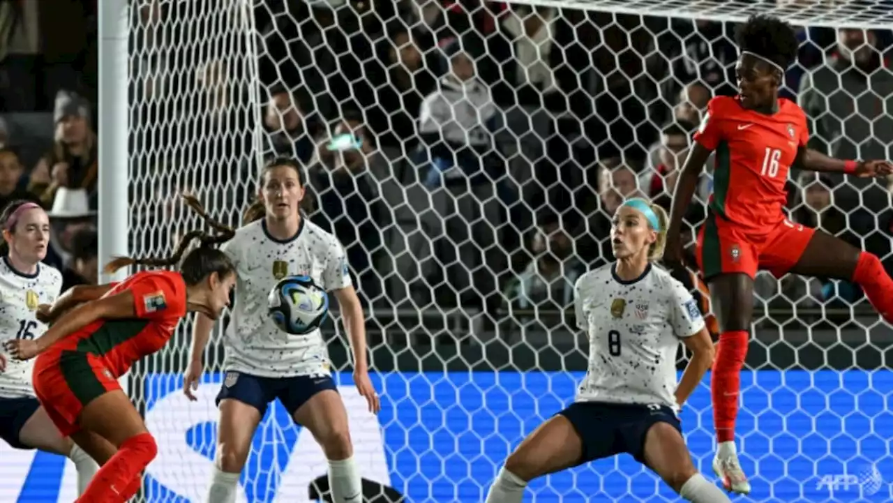 USA survive Portugal scare to reach World Cup last 16