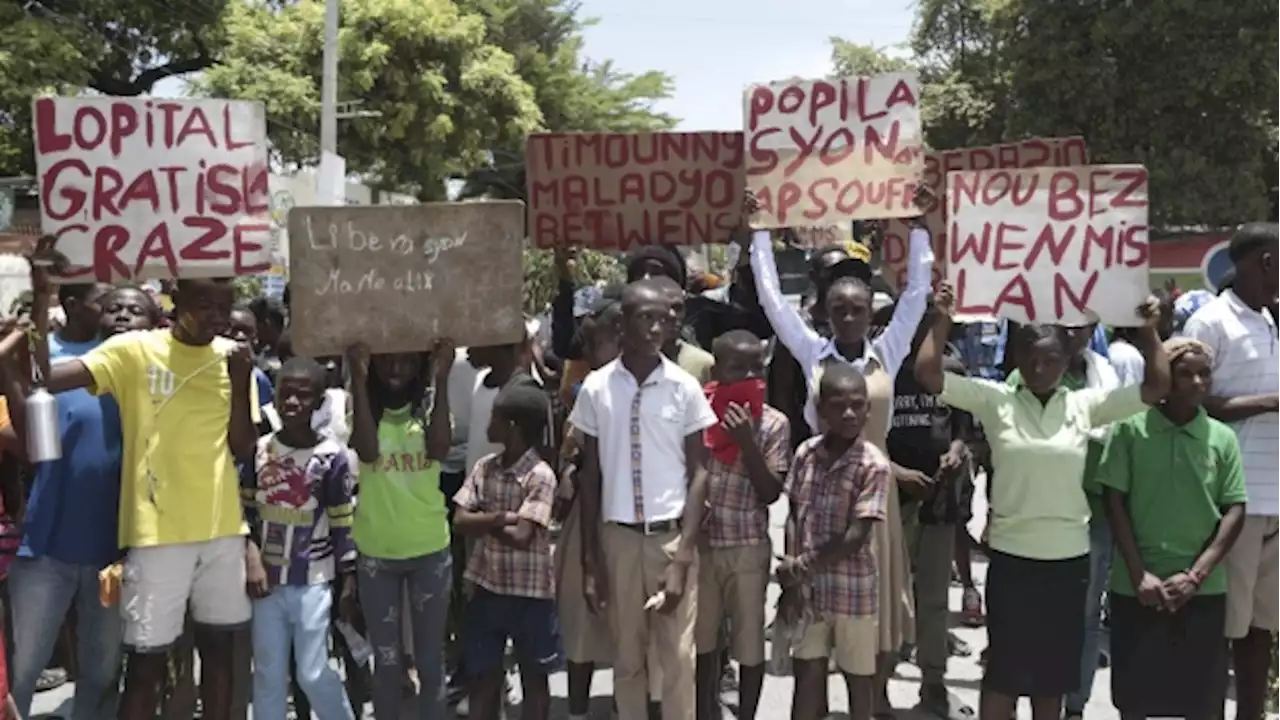 Haitians, weary of gang violence, protest the kidnapping of an American nurse and her daughter