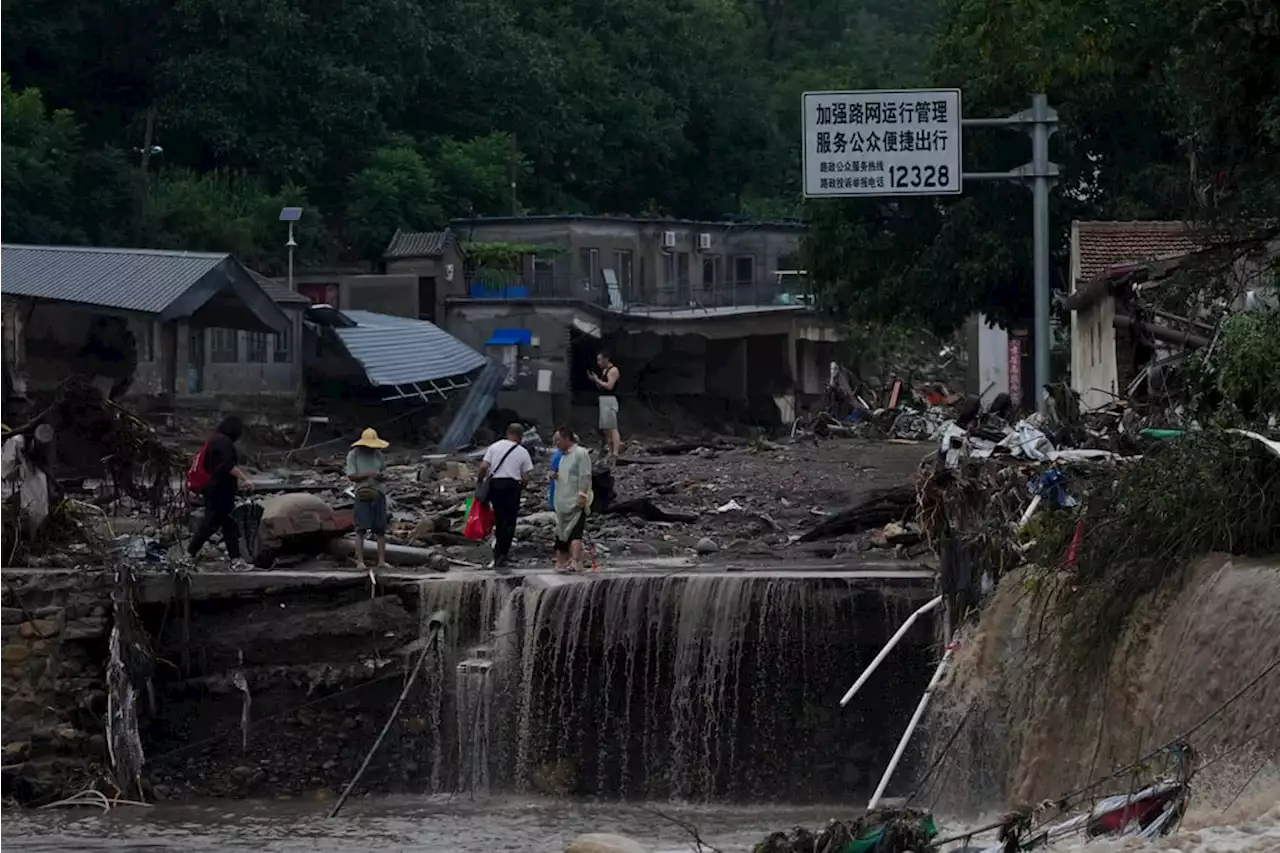 At least 11 killed, 27 missing in Beijing rainstorms