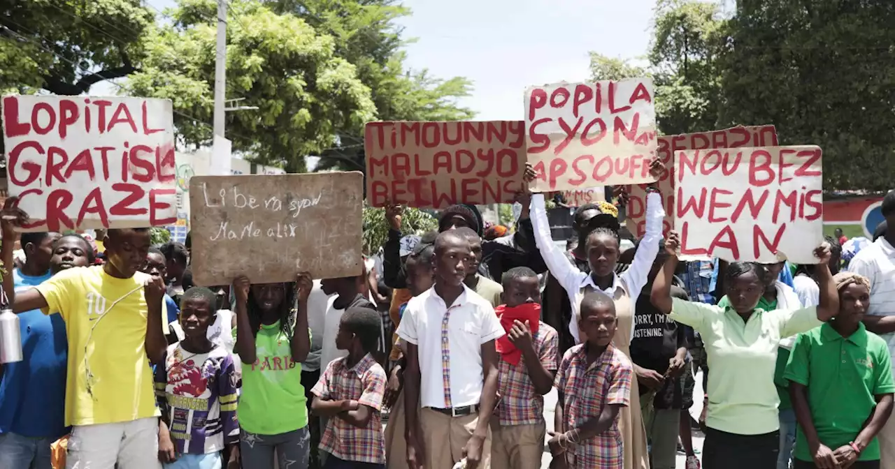 Haitians gather to protest kidnapping of American nurse and her daughter