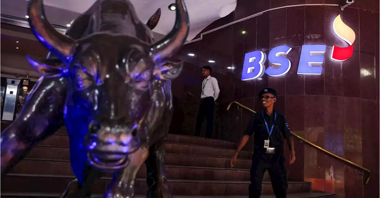 Indian shares open flat; earnings awaited